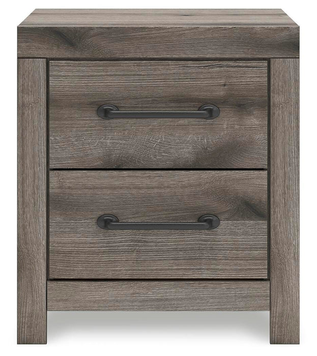 Graystorm bedroom set by Ashley Furniture featuring a modern bed frame and matching nightstands in a sleek gray finish.