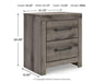 Graystorm bedroom set by Ashley Furniture featuring a modern design with a gray-toned bed frame, matching nightstands, and dresser.