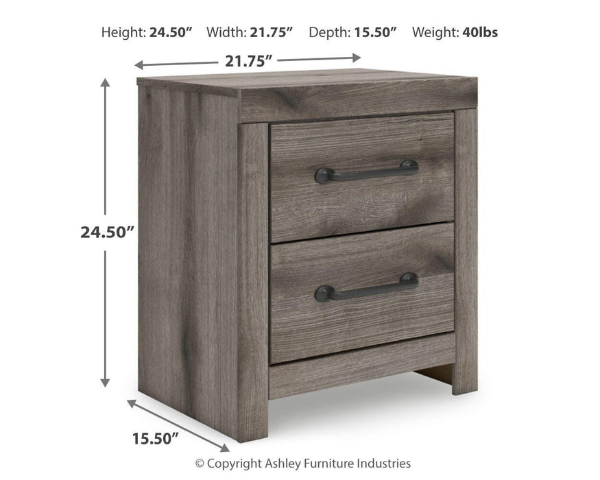 Graystorm bedroom set by Ashley Furniture featuring a modern bed frame, nightstands, and matching dresser in a gray finish.