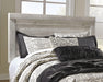 Ashley Furniture Bellaby Bed with dark wood finish, showcasing a modern bed frame with upholstered headboard and sleek design.
