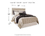 Ashley Furniture Bellaby Bed with a classic wooden frame and neutral finish, shown in a cozy bedroom setting.