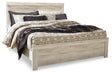 Ashley Furniture Bellaby Bed with a modern design, featuring a sturdy frame and a stylish headboard, shown in a natural wood finish.
