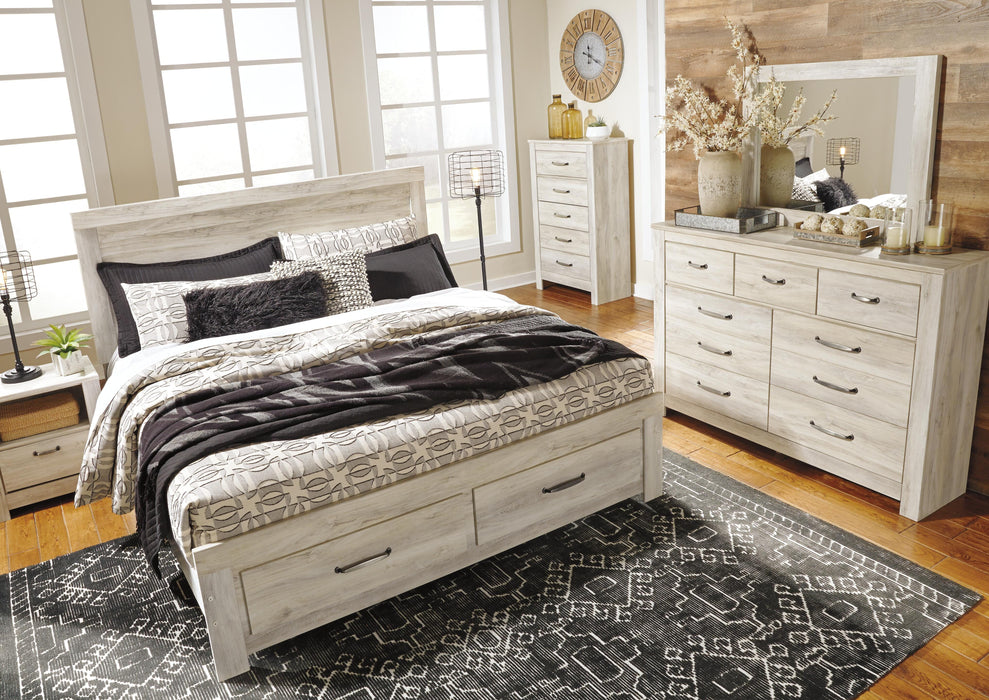 Ashley Furniture Bellaby Bed in neutral fabric with a modern design, featuring a padded headboard and wooden legs.