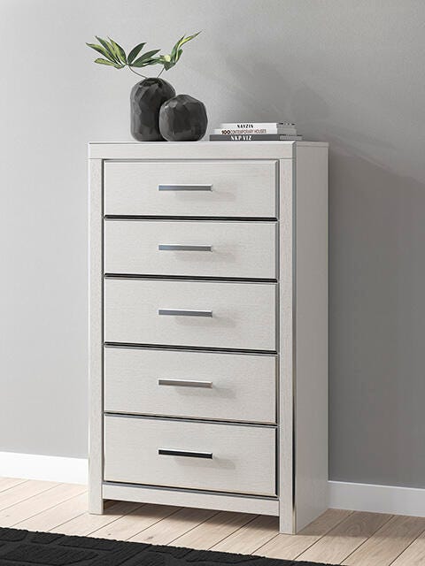 Ashley Furniture Zuraleus chest of drawers with a modern design, featuring multiple drawers and a sleek wood finish.