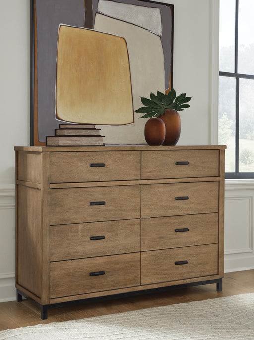 Ashley Furniture Tomtyn dresser with a modern design, featuring clean lines and a wood finish, shown in a close-up image.