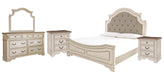 Ashley Furniture Realyn bedroom set with a bed, dresser, and nightstands in a modern bedroom interior.
