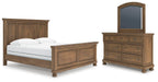 Ashley Furniture Feddinger bedroom set with a bed, nightstands, and dresser in a modern design, shown in a stylish bedroom setting.