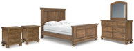 Ashley Furniture Feddinger bedroom set with a modern bed frame, matching nightstands, and dresser in a cozy bedroom setting.