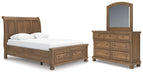 Ashley Furniture Feddinger bedroom set with a modern bed frame, matching nightstands, and a stylish dresser in a cozy bedroom setting.