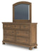 Ashley Furniture Feddinger bedroom set featuring a bed with a tufted upholstered headboard, matching nightstands, and a coordinated dresser.