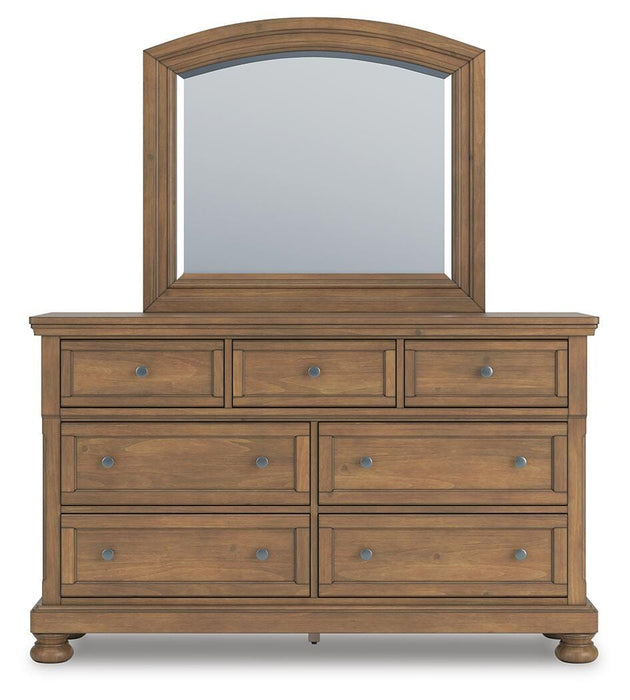 Ashley Furniture Feddinger bedroom set featuring a headboard with a modern design in a cozy bedroom setting.