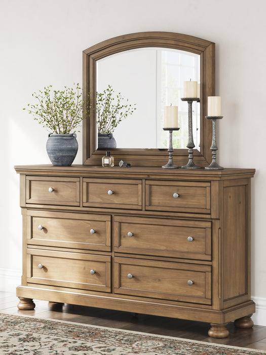 Ashley Furniture Feddinger bedroom set featuring a bed, dresser, and nightstands with a modern design and dark wood finish.