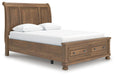 Ashley Furniture Feddinger bedroom set with a stylish bed frame, matching nightstands, and coordinated bedding in a cozy bedroom setting.