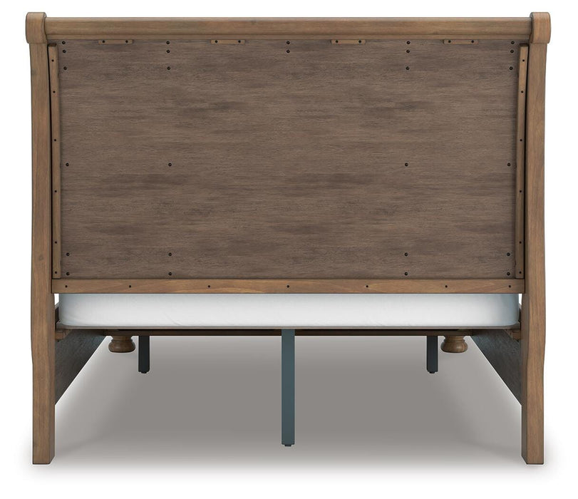 Ashley Furniture Feddinger bedroom set featuring a bed frame, nightstands, and matching dresser in a modern bedroom decor.