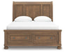 Ashley Furniture Feddinger bedroom set with a headboard and matching furniture in a stylish bedroom scene.