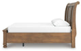 Ashley Furniture Feddinger bedroom set with matching bed frame, nightstands, and dresser in a modern bedroom scene.