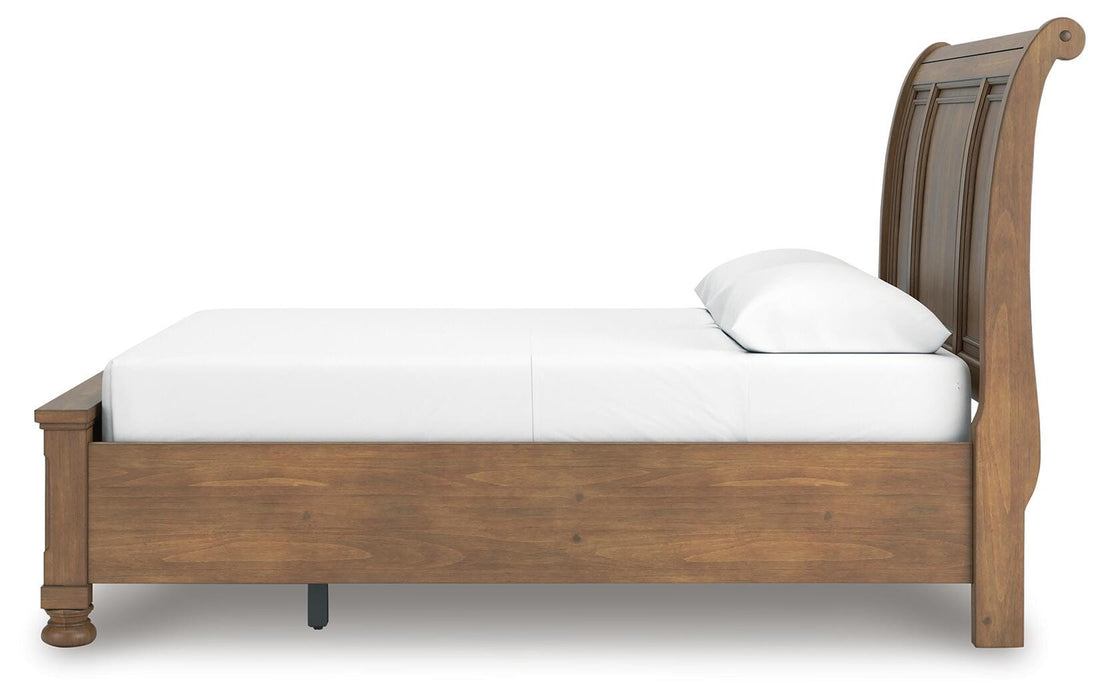 Ashley Furniture Feddinger bedroom set featuring a modern bed frame, nightstands, and matching dresser in a stylish bedroom setup.