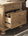 Ashley Furniture Feddinger bedroom set with bed frame, matching nightstands, and dresser in a modern wood finish.