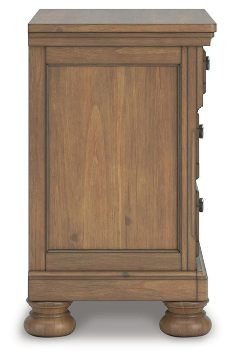 Ashley Furniture Feddinger bedroom set with a bed, matching nightstands, and dresser in a modern bedroom decor.
