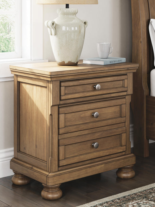 Ashley Furniture Feddinger nightstand with a dark wood finish, featuring drawers and a sleek modern design.