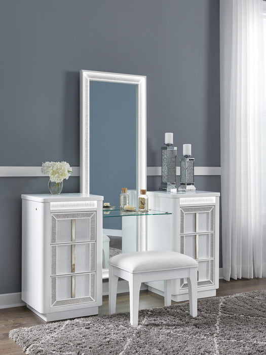 Ashley Furniture Chalanna vanity with mirror, featuring LED lights, modern design, and spacious tabletop for grooming and storage.