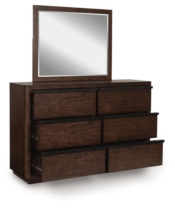 Ashley Furniture Dilenno bedroom set with a bed, nightstands, and dresser, showcasing a modern design in a well-lit bedroom scene.