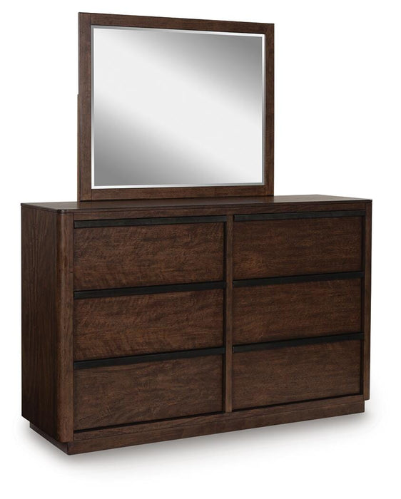 Ashley Furniture Dilenno bedroom set featuring a modern bed frame with matching nightstands and dresser in a stylish bedroom.