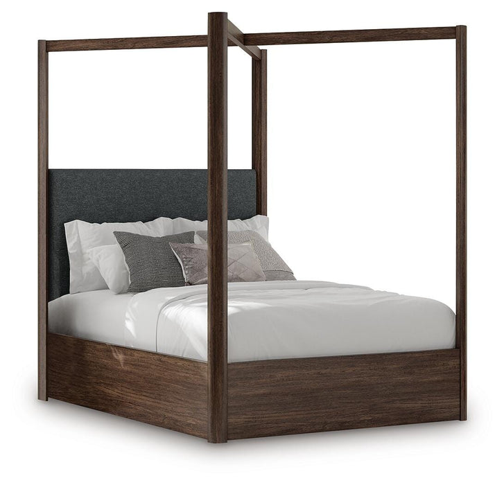 Ashley Furniture Dilenno bedroom set featuring a bed frame, nightstands, and a dresser in a modern bedroom design.