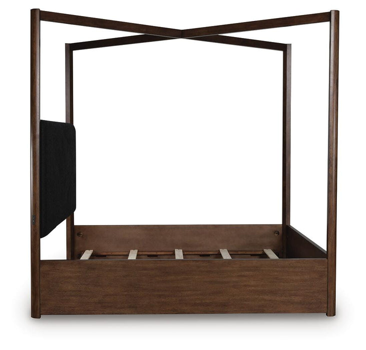 Ashley Furniture Dilenno bedroom set featuring a bed frame, nightstands, and matching furniture in a modern bedroom setting
