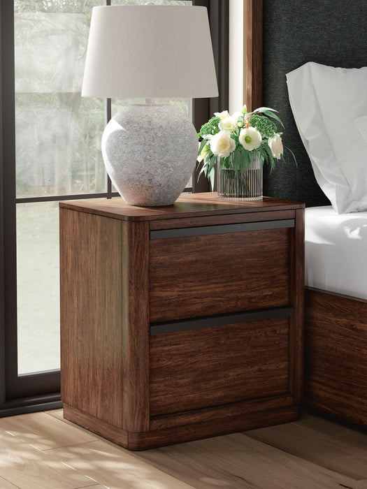 Ashley Furniture Dilenno bedroom set with a stylish bed frame, matching nightstands, and a coordinated dresser in a modern design.