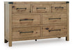 Ashley Furniture Ridgester dresser and mirror set, angled view showing the wood finish and mirror frame in a bedroom setting.