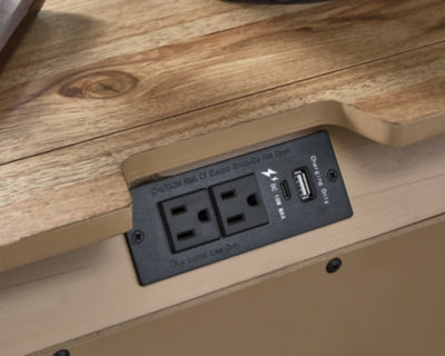 Ashley Furniture Ridgester nightstand with power outlet and USB ports, featuring a modern wooden design and sleek finish.
