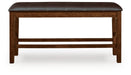 Ashley Furniture Ralene counter height dining bench with wooden legs and upholstered seat, shown from head-on angle.