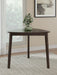 Ashley Furniture Mallenette dining room set with a wooden table and upholstered chairs, ideal for modern dining spaces.