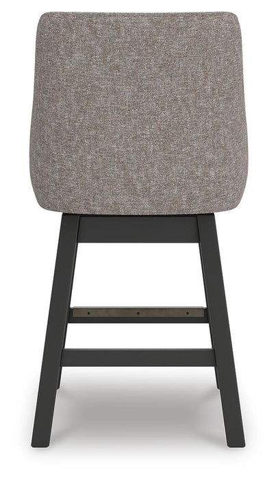 Ashley Furniture Neymorton counter height barstool with wooden legs and upholstered seat, shown from the back.