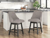 Ashley Furniture Neymorton counter height barstool with wooden legs and upholstered seat, shown from a side view.