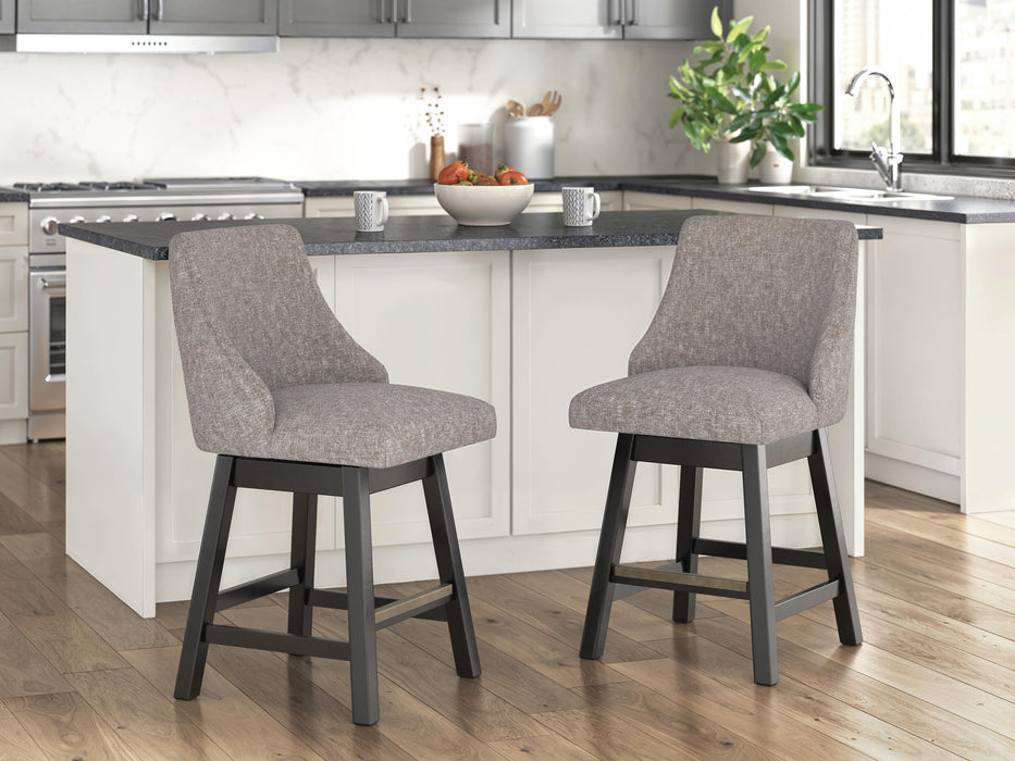 Ashley Furniture Neymorton counter height barstool with wooden legs and upholstered seat, shown from a side view.