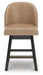 Ashley Furniture Neymorton counter height barstool with dark wood finish and cushioned seat, shown from front view.