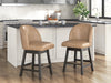 Ashley Furniture Neymorton counter height barstool with wooden legs and upholstered seat, shown from a side angle.