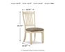 Ashley Furniture Bolanburg dining room set with a wooden table and six chairs, featuring a classic design and warm wood finish.