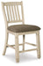 Ashley Furniture Bolanburg dining room set with a table and chairs, shown from an angled view in a modern dining space.