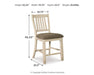 Ashley Furniture Bolanburg dining room set with a wooden table and matching chairs, ideal for a stylish dining space.