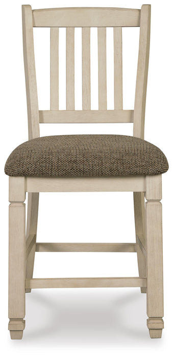 Ashley Furniture Bolanburg dining room set with a rectangular table and upholstered chairs, shown from a head-on angle.