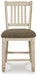 Ashley Furniture Bolanburg dining room set with a rectangular table and upholstered chairs, shown from a head-on angle.