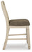 Ashley Furniture Bolanburg dining room set with a table and chairs, shown in a warm wood finish with a modern design.