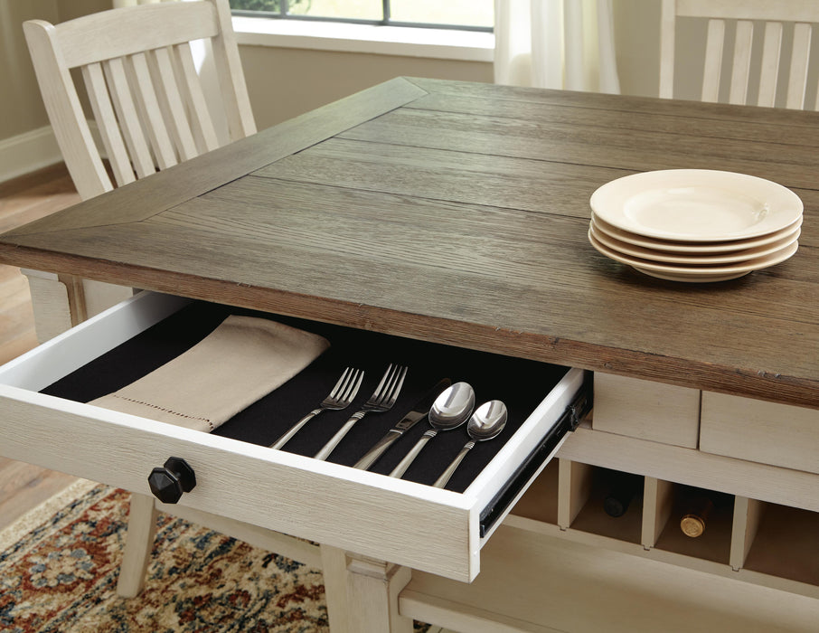 Ashley Furniture Bolanburg dining room set with a wooden table and matching chairs, detailed view of the table surface.