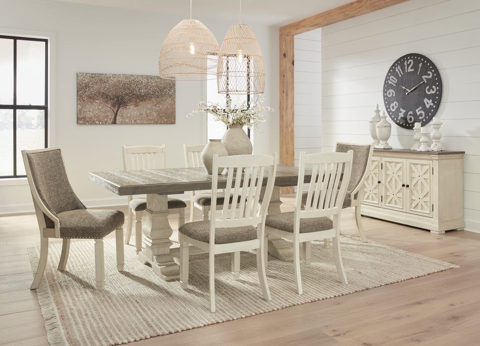 Ashley Furniture Bolanburg dining room set with a wooden table and matching chairs, shown in a modern dining space.
