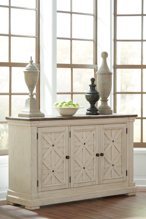 Ashley Furniture Bolanburg dining server with wood finish, featuring multiple drawers and cabinet storage for dining room organization.