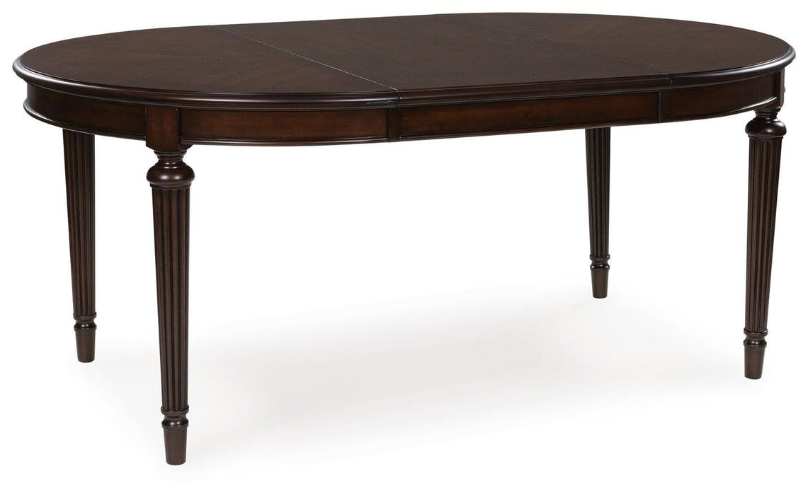 Ashley Furniture Lavinton dining room set with a leaf-shaped table and matching chairs, stylish and modern for elegant dining.