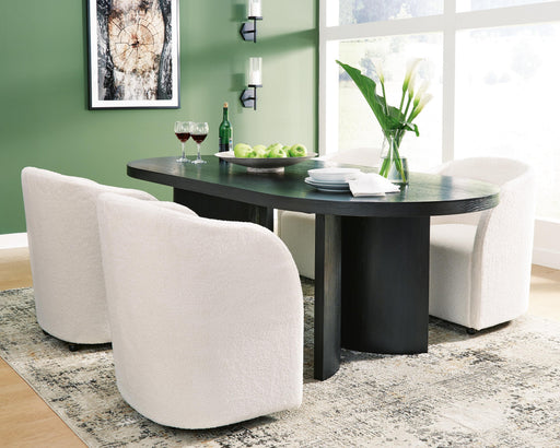Ashley Furniture Rowanbeck dining room set with a wooden table and six matching chairs in a modern dining space.